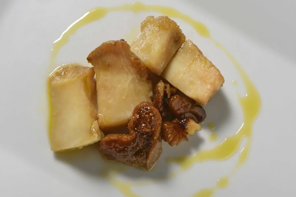 Bacalao confitado con piñones